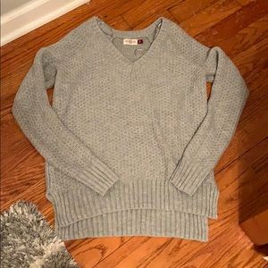 Gray sparkly sweater.